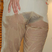 wetting her panties and skirt outside