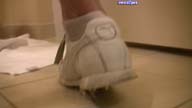 pissing white sneakers